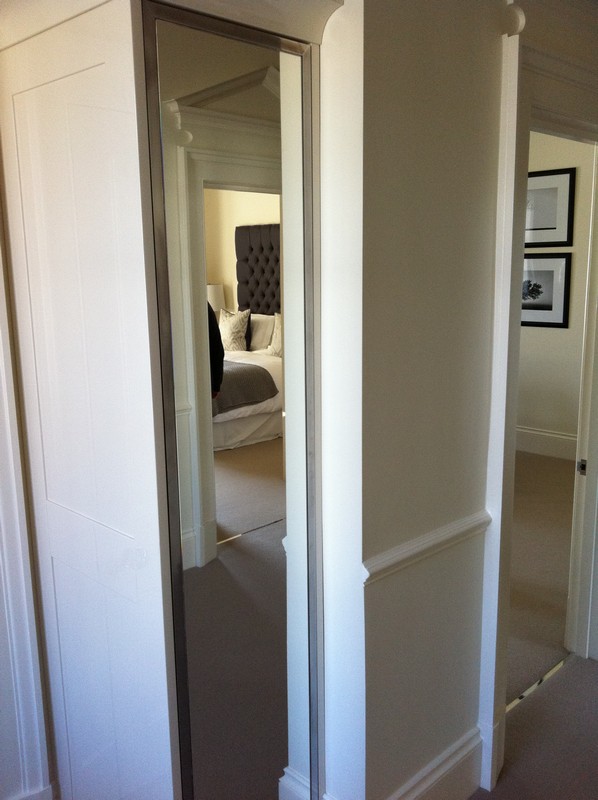 Full-length wardrobe mirror fitted in Kentish Town home